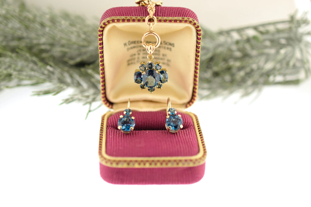 Yellow Gold Blue Spinel Set for Birthday or Christmas. Lever back earrings and Pendant Gold Set. Vintage 14k Gold December Birthstone Jewelry. Rutledge Exchange is a Boutique Jewelry and Antiques Business in Historic Downtown Camden SC.