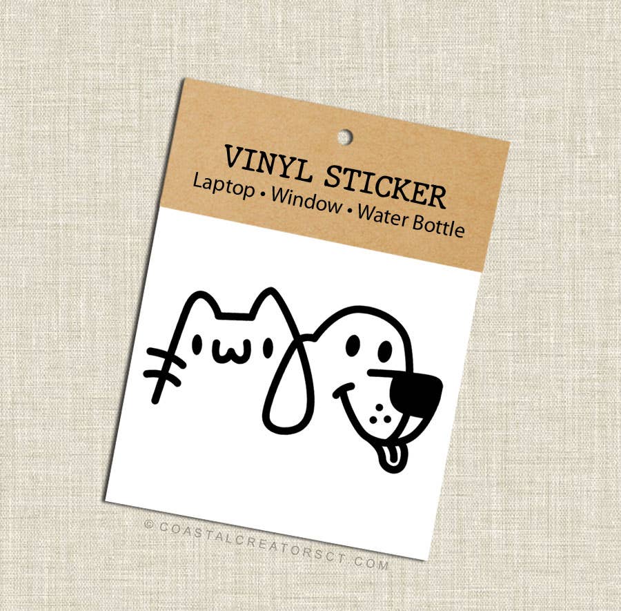 Vinyl sticker with dog and cat design on a cardboard backing with text. Rutledge Exchange is a boutique jewelry and antique store in Camden, SC. &nbsp;