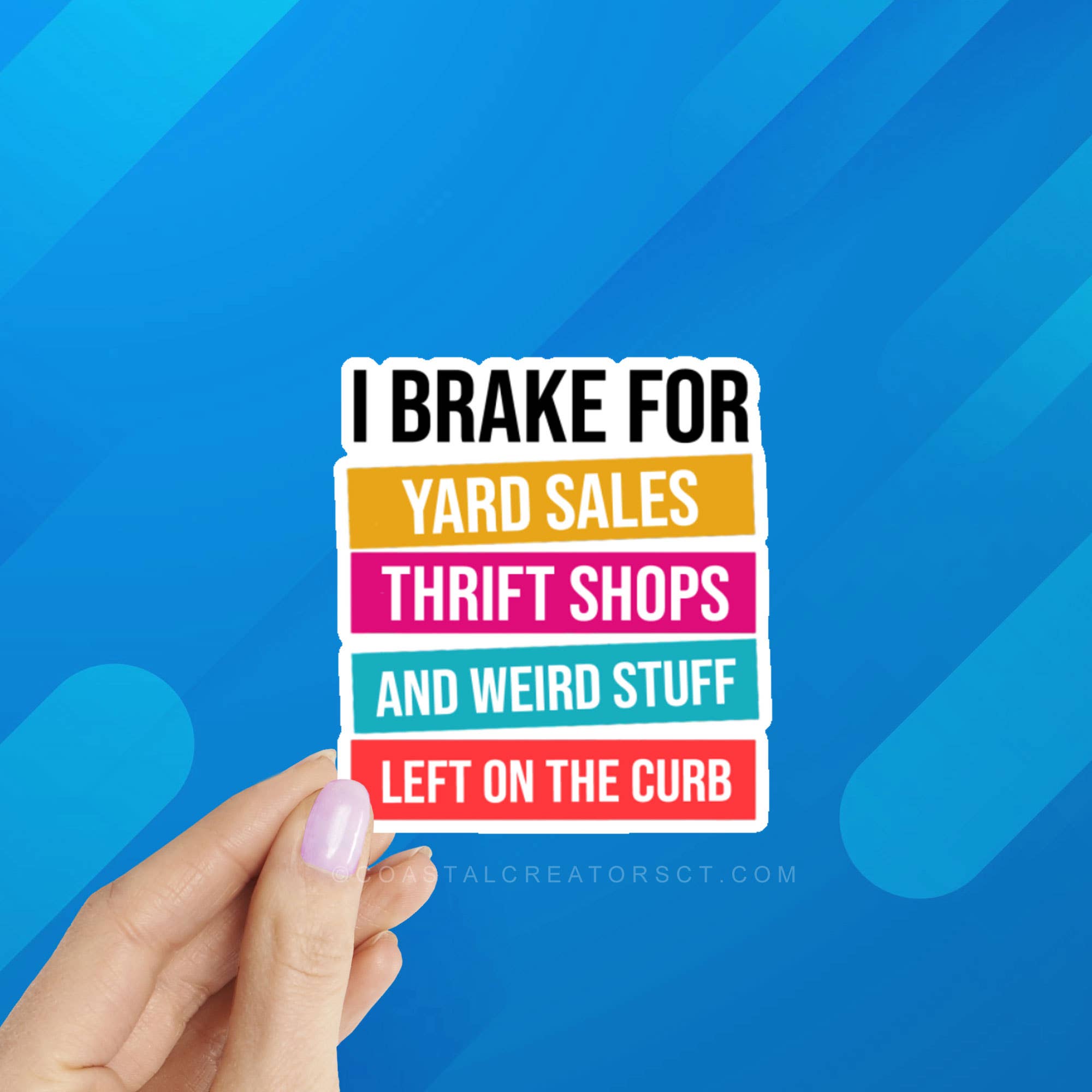 Sticker with humorous text held by a hand against a blue background at Rutledge Exchange is a boutique jewelry and antique store in Camden, SC.