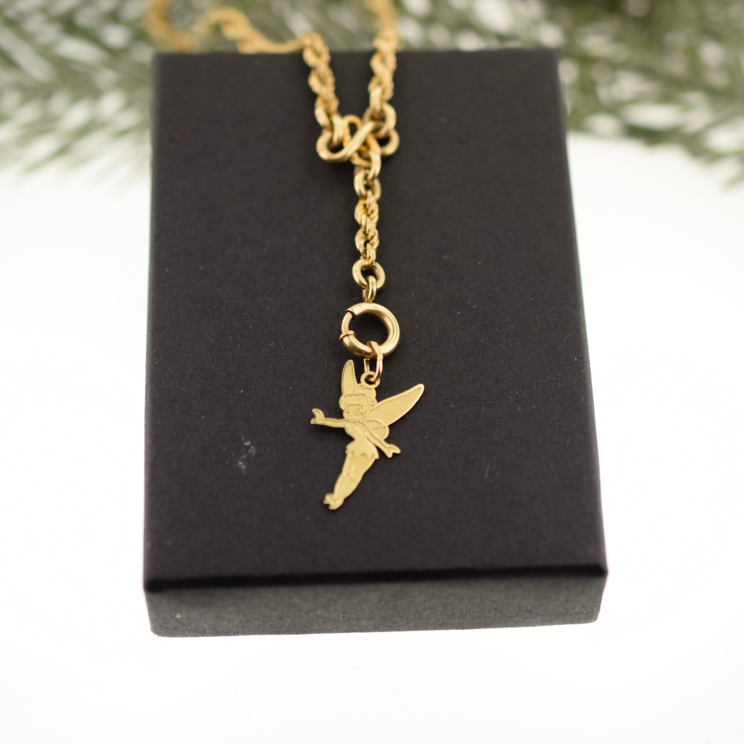 This 14k yellow gold Disney Tinkerbell charm is a great addition to any jewelry collection, as it is the perfect size for both a pendant and a charm bracelet. Its elegant design and quality material make it a desirable item for any fan of the beloved character.     Rutledge Exchange is a Boutique Jewelry and Antiques Business in Historic Downtown Camden SC. We source regionally from Estate Sales, Dealers and Private Sellers.