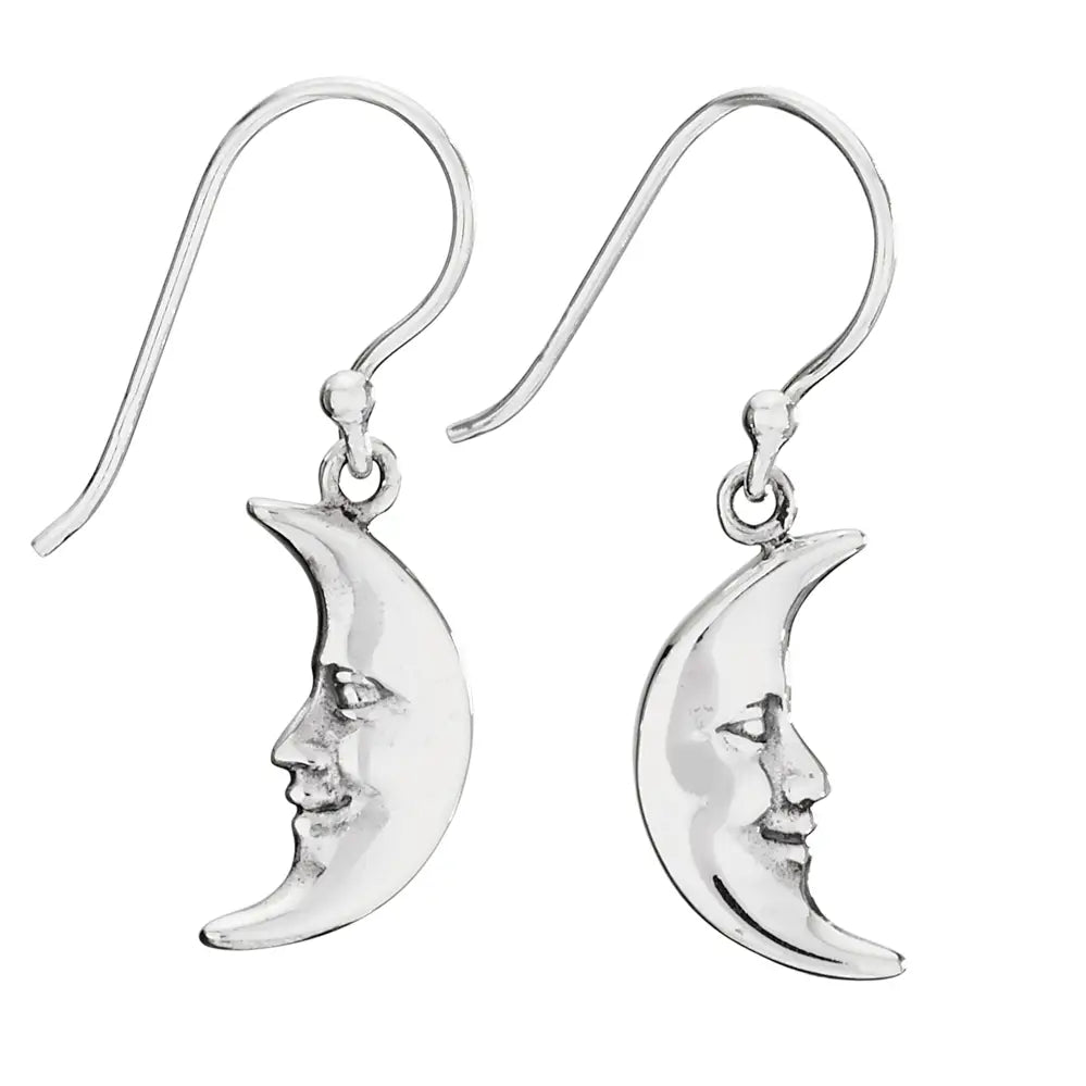 Silver moon-shaped earrings with face designs on a white background. Orbiting Sterling Silver Crescent Moon Earrings | Sterling Silver - #E4810