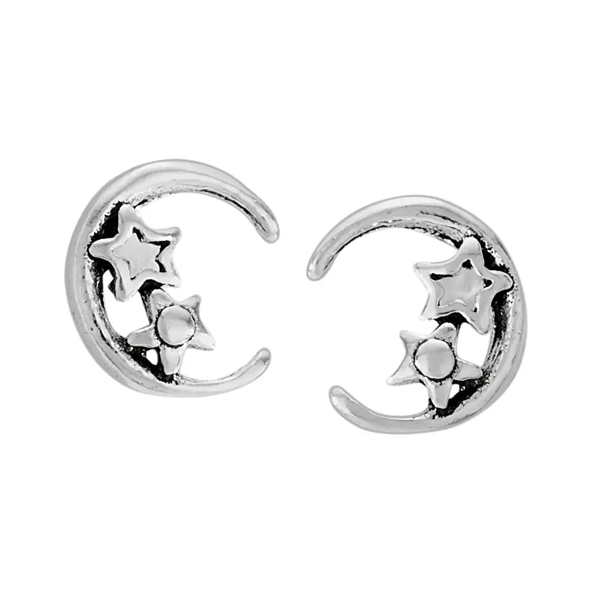 Silver moon and star earrings on a white background