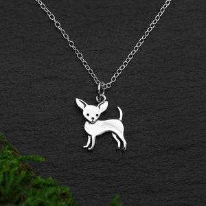 This sterling silver chihuahua dog necklace celebrates one of the most loyal dogs around. Prized for their loving companionship, your lap will quickly become a chihuahua's sole property. Famous for their over-sized, apple-shaped foreheads & googly eyes, these tiny dogs have giant personalities. While loyal to their owners, chihuahuas are mistrustful of all others, making this breed the world's tiniest watchdog. Don't let their tiny size fool you. This little pooch is one of the fiercest in dogdom!